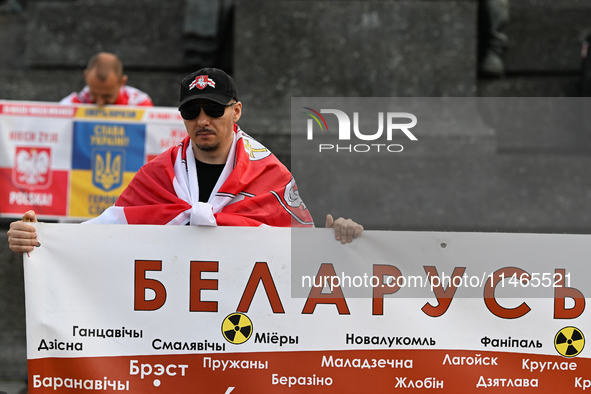 KRAKOW, POLAND - AUGUST 9:
Members of the Belarusian diaspora gather at Krakow's Market Square for the Day of Solidarity with Belarus rally,...