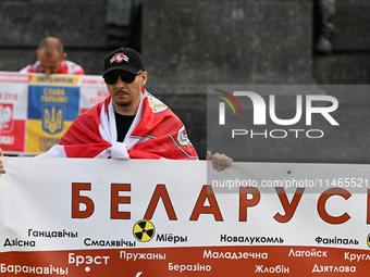 KRAKOW, POLAND - AUGUST 9:
Members of the Belarusian diaspora gather at Krakow's Market Square for the Day of Solidarity with Belarus rally,...