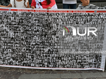 KRAKOW, POLAND - AUGUST 9:
Members of the Belarusian diaspora gather at Krakow's Market Square for the Day of Solidarity with Belarus rally,...