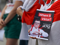 KRAKOW, POLAND - AUGUST 9:
A member of the Belarusian diaspora holds a poster with the inscription 'Where is Viktar? No contact for 470 days...