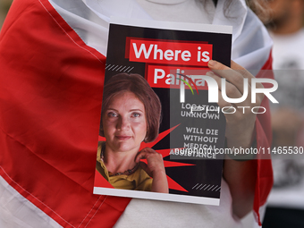 KRAKOW, POLAND - AUGUST 9:
A member of the Belarusian diaspora holds a poster with the inscription 'Where is Palina? Location unknown,' feat...