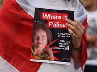 KRAKOW, POLAND - AUGUST 9:
A member of the Belarusian diaspora holds a poster with the inscription 'Where is Palina? Location unknown,' feat...