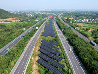 A sub-belt photovoltaic power station is being shown in the G5011 Wuhu-Hefei Expressway test tunnel in Chaohu, China, on August 9, 2024. (