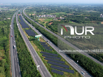 A sub-belt photovoltaic power station is being shown in the G5011 Wuhu-Hefei Expressway test tunnel in Chaohu, China, on August 9, 2024. (