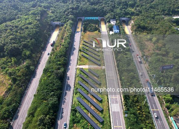 A sub-belt photovoltaic power station is being shown in the G5011 Wuhu-Hefei Expressway test tunnel in Chaohu, China, on August 9, 2024. 