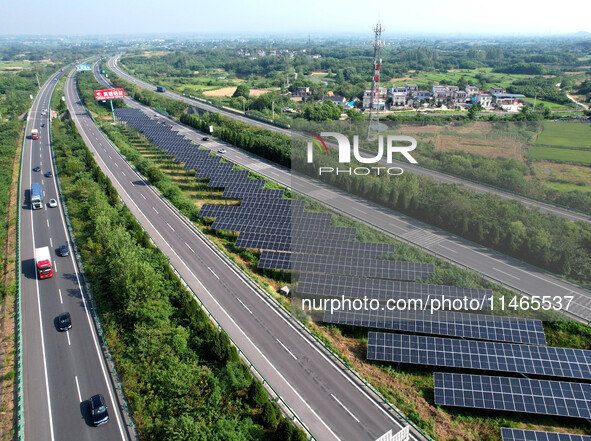 A sub-belt photovoltaic power station is being shown in the G5011 Wuhu-Hefei Expressway test tunnel in Chaohu, China, on August 9, 2024. 