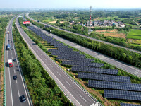 A sub-belt photovoltaic power station is being shown in the G5011 Wuhu-Hefei Expressway test tunnel in Chaohu, China, on August 9, 2024. (