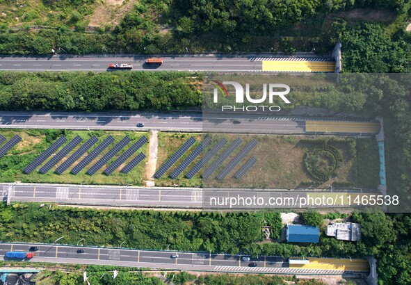 A sub-belt photovoltaic power station is being shown in the G5011 Wuhu-Hefei Expressway test tunnel in Chaohu, China, on August 9, 2024. 