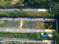 A sub-belt photovoltaic power station is being shown in the G5011 Wuhu-Hefei Expressway test tunnel in Chaohu, China, on August 9, 2024. (