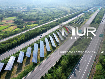 A sub-belt photovoltaic power station is being shown in the G5011 Wuhu-Hefei Expressway test tunnel in Chaohu, China, on August 9, 2024. (