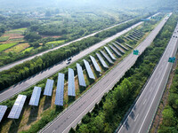 A sub-belt photovoltaic power station is being shown in the G5011 Wuhu-Hefei Expressway test tunnel in Chaohu, China, on August 9, 2024. (