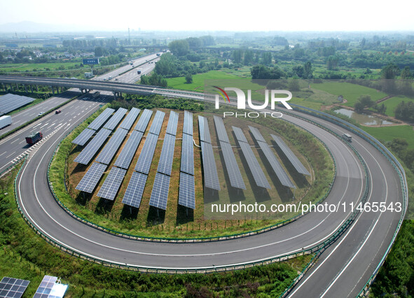 A sub-belt photovoltaic power station is being shown in the G5011 Wuhu-Hefei Expressway test tunnel in Chaohu, China, on August 9, 2024. 