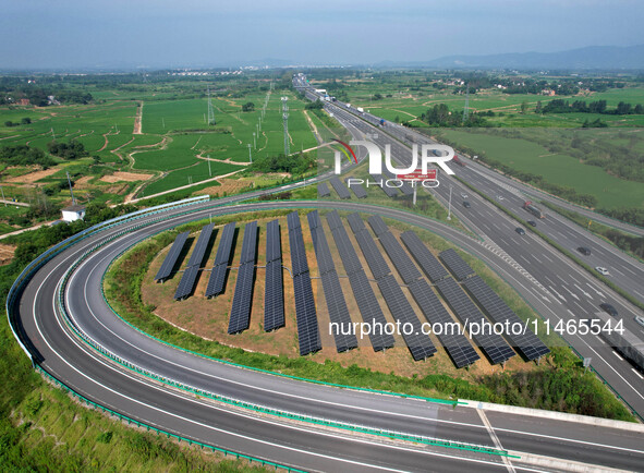 A sub-belt photovoltaic power station is being shown in the G5011 Wuhu-Hefei Expressway test tunnel in Chaohu, China, on August 9, 2024. 