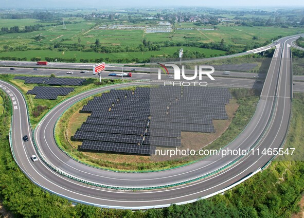 A sub-belt photovoltaic power station is being shown in the G5011 Wuhu-Hefei Expressway test tunnel in Chaohu, China, on August 9, 2024. 