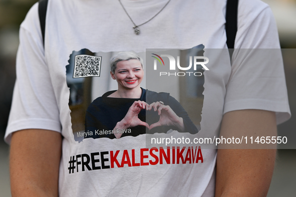 KRAKOW, POLAND - AUGUST 9:
A member of the Belarusian diaspora wears a t-shirt with the inscription 'Free Kalesnikava' featuring a political...