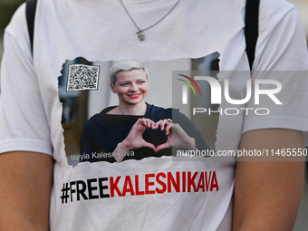 KRAKOW, POLAND - AUGUST 9:
A member of the Belarusian diaspora wears a t-shirt with the inscription 'Free Kalesnikava' featuring a political...