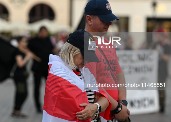 KRAKOW, POLAND - AUGUST 9:
Members of the Belarusian diaspora gather at Krakow's Market Square for the Day of Solidarity with Belarus rally,...