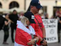 KRAKOW, POLAND - AUGUST 9:
Members of the Belarusian diaspora gather at Krakow's Market Square for the Day of Solidarity with Belarus rally,...