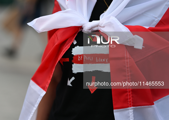 KRAKOW, POLAND - AUGUST 9:
Members of the Belarusian diaspora gather at Krakow's Market Square for the Day of Solidarity with Belarus rally,...