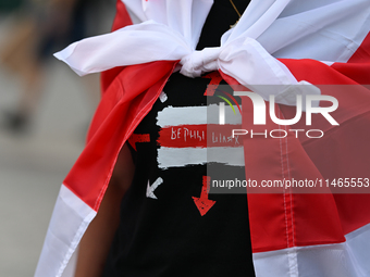 KRAKOW, POLAND - AUGUST 9:
Members of the Belarusian diaspora gather at Krakow's Market Square for the Day of Solidarity with Belarus rally,...