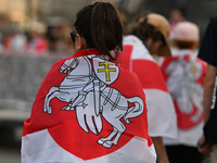 KRAKOW, POLAND - AUGUST 9:
Members of the Belarusian diaspora, many displaying white-red-white opposition flags, gather at Krakow's Market S...