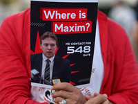 KRAKOW, POLAND - AUGUST 9:
A member of the Belarusian diaspora holds a poster with the inscription 'Where is Maxim? No contact for 548 days,...