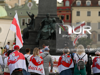 KRAKOW, POLAND - AUGUST 9:
Members of the Belarusian diaspora, many displaying white-red-white opposition flags, gather at Krakow's Market S...