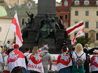 KRAKOW, POLAND - AUGUST 9:
Members of the Belarusian diaspora, many displaying white-red-white opposition flags, gather at Krakow's Market S...