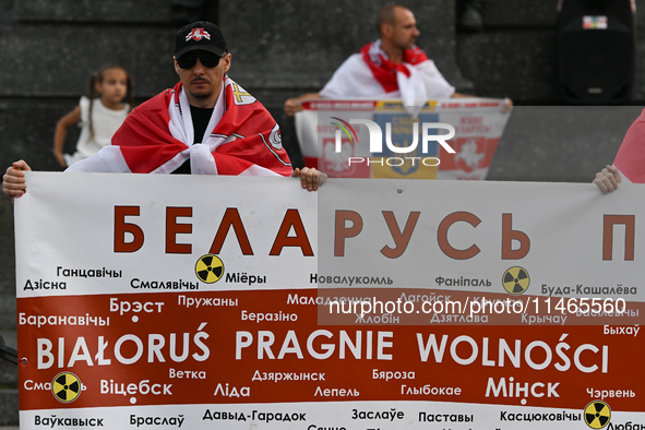 KRAKOW, POLAND - AUGUST 9:
Members of the Belarusian diaspora gather at Krakow's Market Square for the Day of Solidarity with Belarus rally,...