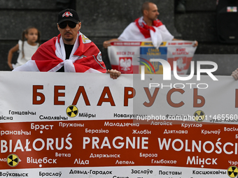 KRAKOW, POLAND - AUGUST 9:
Members of the Belarusian diaspora gather at Krakow's Market Square for the Day of Solidarity with Belarus rally,...