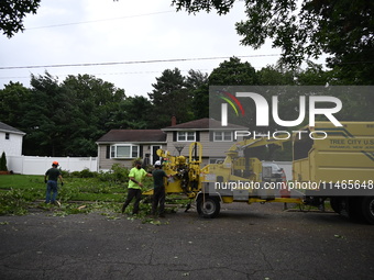 A large tree is uprooting and causing major damage to a home on Wynetta Place during severe weather impacting the northeastern United States...