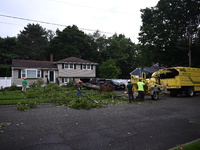 A large tree is uprooting and causing major damage to a home on Wynetta Place during severe weather impacting the northeastern United States...