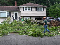 A large tree is uprooting and causing major damage to a home on Wynetta Place during severe weather impacting the northeastern United States...