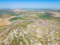 The meandering Tarim River is nourishing vegetation along its banks in the Weili section of the middle and lower reaches of the Tarim River...