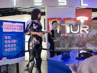 Humanoid robot Xiao Qi is having a dialogue with visitors during the event of Qixi, a traditional Chinese Valentine festival, at Long Zhi Mo...