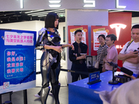 Humanoid robot Xiao Qi is having a dialogue with visitors during the event of Qixi, a traditional Chinese Valentine festival, at Long Zhi Mo...