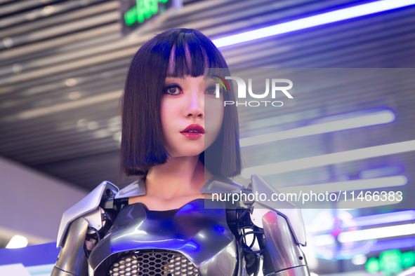 Humanoid robot Xiao Qi is having a dialogue with visitors during the event of Qixi, a traditional Chinese Valentine festival, at Long Zhi Mo...