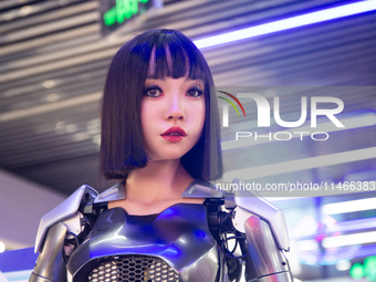 Humanoid robot Xiao Qi is having a dialogue with visitors during the event of Qixi, a traditional Chinese Valentine festival, at Long Zhi Mo...