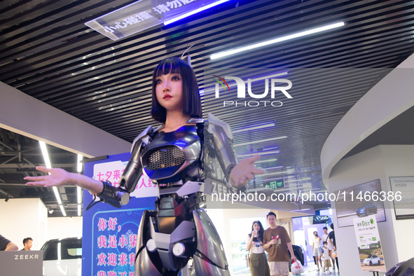 Humanoid robot Xiao Qi is having a dialogue with visitors during the event of Qixi, a traditional Chinese Valentine festival, at Long Zhi Mo...