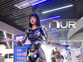 Humanoid robot Xiao Qi is having a dialogue with visitors during the event of Qixi, a traditional Chinese Valentine festival, at Long Zhi Mo...