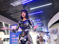 Humanoid robot Xiao Qi is having a dialogue with visitors during the event of Qixi, a traditional Chinese Valentine festival, at Long Zhi Mo...