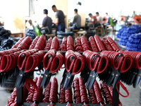 Workers of an enterprise are producing scissors on the production line at Yanshan Ocean Knife and Scissors Industrial Park in Zherong County...