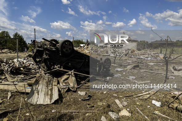 A residential building in a village in the Kyiv region is being heavily damaged during a massive Russian missile and drone attack on Ukraine...