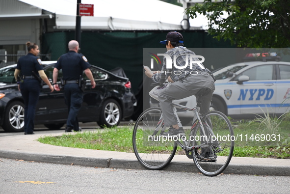 A male is being stabbed in the torso at Randall's Island Migrant Shelter in Manhattan, New York, United States, on August 11, 2024. At appro...