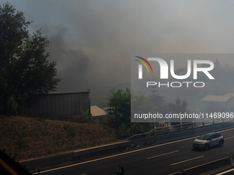 A fire is breaking out in Naples, Italy, on Sunday, in the Capodichino Airport area. The cloud of smoke is invading the A56 at the height of...