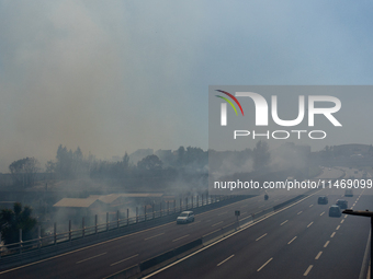 A fire is breaking out in Naples, Italy, on Sunday, in the Capodichino Airport area. The cloud of smoke is invading the A56 at the height of...