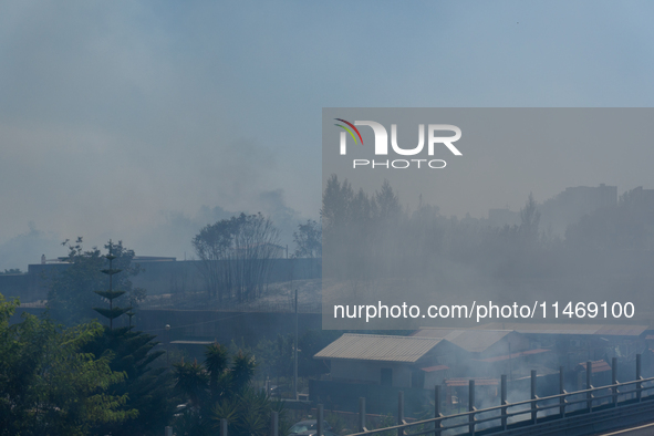 A fire is breaking out in Naples, Italy, on Sunday, in the Capodichino Airport area. The cloud of smoke is invading the A56 at the height of...