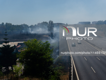 A fire is breaking out in Naples, Italy, on Sunday, in the Capodichino Airport area. The cloud of smoke is invading the A56 at the height of...