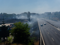 A fire is breaking out in Naples, Italy, on Sunday, in the Capodichino Airport area. The cloud of smoke is invading the A56 at the height of...