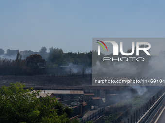 A fire is breaking out in Naples, Italy, on Sunday, in the Capodichino Airport area. The cloud of smoke is invading the A56 at the height of...